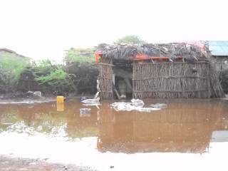Rainwater pools on the ground in a village in Gedo - File photo